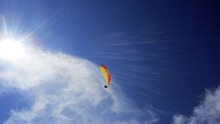 Try local paragliding in the village